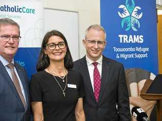 BIG BOOST: Announcing a $400,000 increase to refugee service TRAMS are (from left) Groom MP John McVeigh, CatholicCare director Kate Venables and Families and Social Services Minister Paul Fletcher. Picture: Nev Madsen