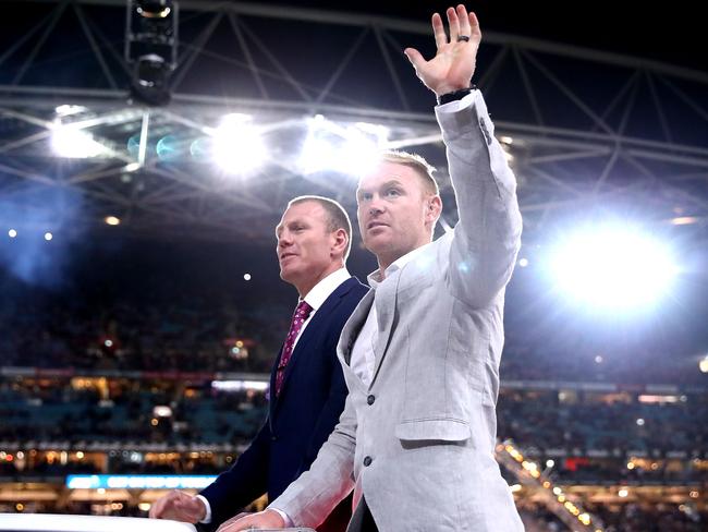 Retiring players Luke Lewis and Peter Wallace thank the crowd before last year’s NRL Grand Final. Picture: Cameron Spencer/Getty Images