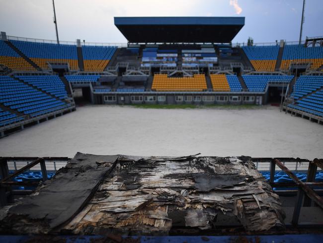 More rotting wood sits around the abandoned beach volleyball stadium.