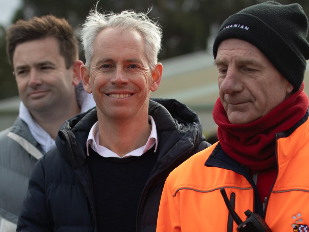 Former Tasmanian Premier Peter Gutwein (right) completes the walk at Montrose Foreshore. Federal Minister for Multicultural affairs Andrew Giles (centre) addressed the crowd, which included Labor Leader Dean Winter (left) after the event. Picture: Linda Higginson