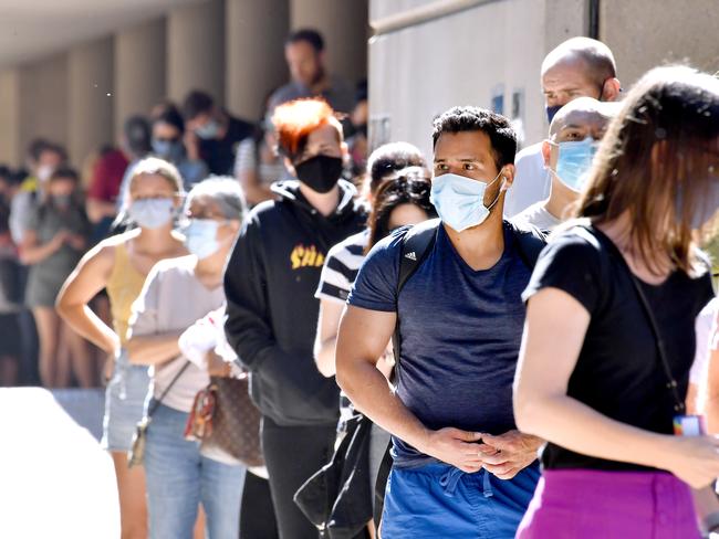 BRISBANE, AUSTRALIA - NewsWire Photos September 20, 2021: Lines of people at the Brisbane vaccination hub at Brisbane Convention and Exhibition Centre after a record-breaking weekend leads Queensland several steps closer to opening its borders.Picture: NCA NewsWire / John Gass