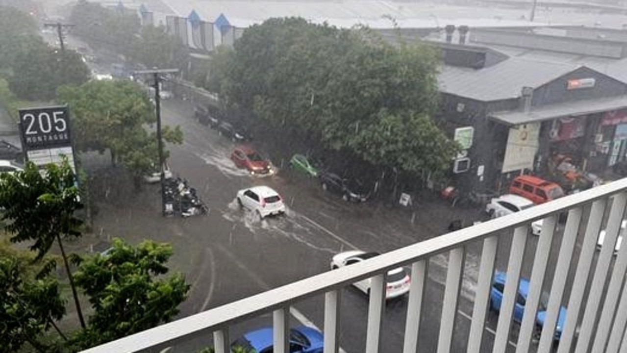 Montague Road between Donkin Street and Mollison Street in West End has also been inundated with water. Picture: Jan Wild