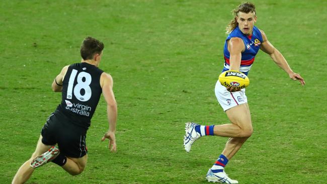 Bulldogs young gun Bailey Smith sells some candy to last year’s Rising Star winner Sam Walsh. Picture: Getty Images