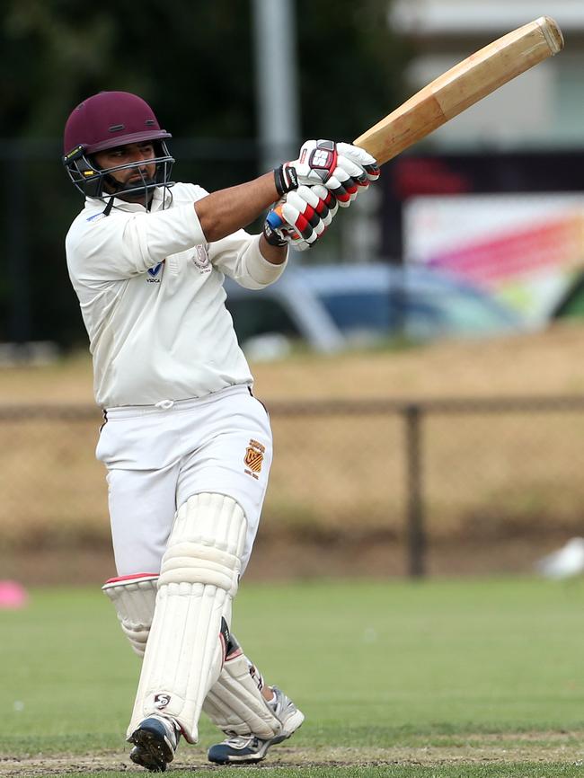 Javed Bolim cracks a ball through the leg side for Coburg. Picture: Hamish Blair