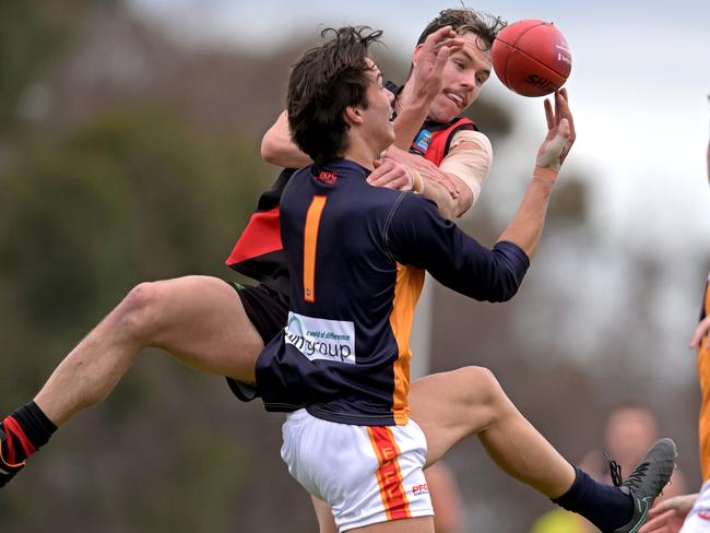 EDFL: Pascoe Vale’s Benjamin McDonell tangles with Ben Silvagni of East Keilor. Picture: Andy Brownbill