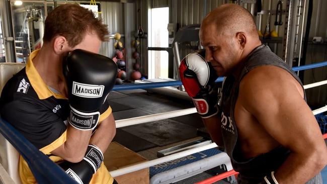 Former NRL legend Matt Bowen (right), sparring with Aaron Stahl, is getting back into his All Stars Boxing preparation at Hawks Gym. Picture: Evan Morgan