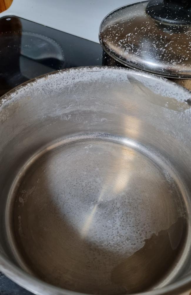 A pot after boiling affected water in Raceview.