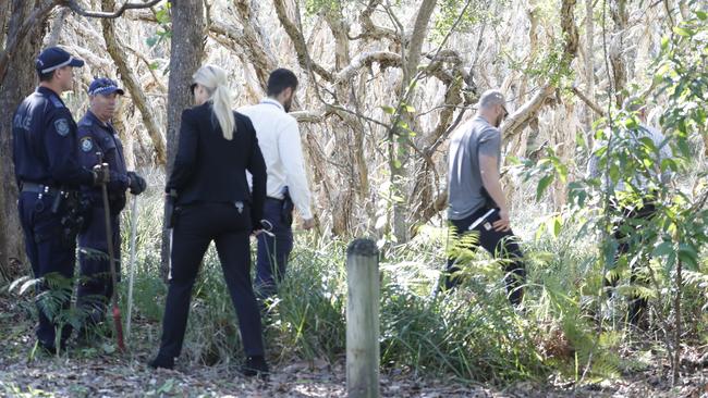 Police search bush in the Arakwal National Park near Tallow Beach, Byron Bay, northern NSW, on Wednesday as part of the investigation into the 2019 disappearance of Thea Liddle. Picture: Liana Turner