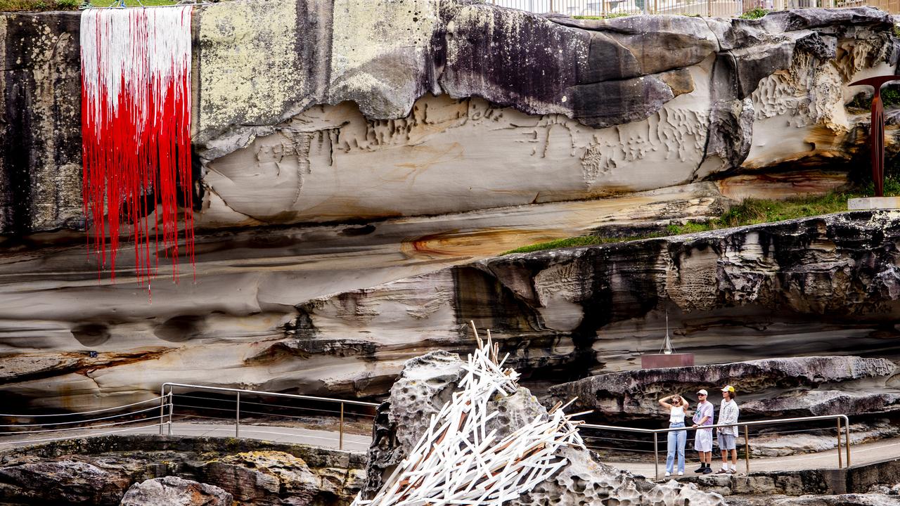 Niharika Hukku work’s Shelter is perched on top of the cliff face while Alyssa Sykes-Smith Reclaimed Chaos is also visible on the walk. Picture: NewsWire / Jeremy Piper