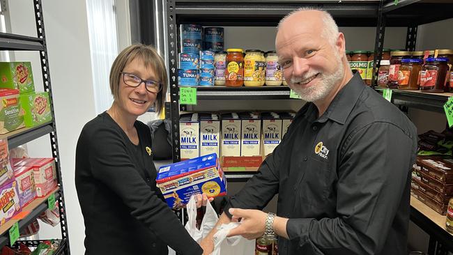 City Mission Burnie Hub facilitator Naomi Maynard and emergency relief and accommodation operations manager Stephen Hill. Picture: Simon McGuire.