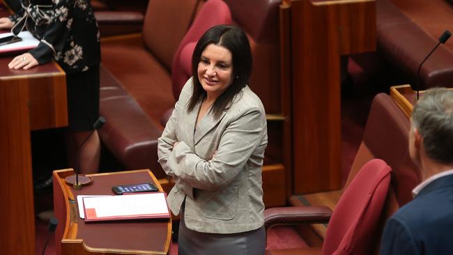 Senator Jacqui Lambie before the swearing-in of new senators in the senate chamber at Parliament House in Canberra today. Photo: Kym Smith