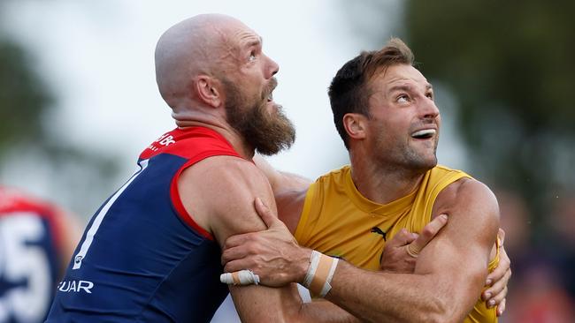 Max Gawn battles Toby Nankervis in a ruck contest.