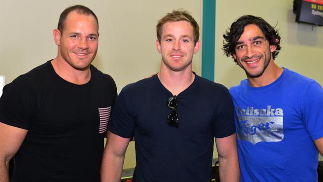 Cowboys players Matt Scott, Michael Morgan and Johnathan Thurston return to Townsville.