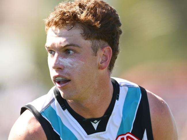 MELBOURNE, AUSTRALIA - MARCH 01: Joe Berry of the Power looks to pass the ball during the 2025 AAMI AFL Community Series match between St Kilda Saints and Port Adelaide Power at RSEA Park on March 01, 2025 in Melbourne, Australia. (Photo by Quinn Rooney/Getty Images)