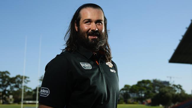 Aaron Woods poses for a portrait after he was announced as Wests Tigers captain at Concord Oval, Sydney. Pic Brett Costello