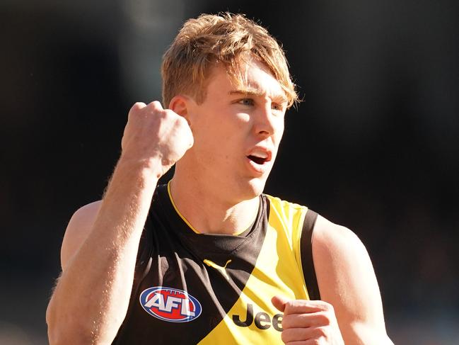 MELBOURNE, AUSTRALIA - JULY 20: Tom Lynch of the Tigers celebrates after kicking a goal during the round 18 AFL match between the Richmond Tigers and the Port Adelaide Power at Melbourne Cricket Ground on July 20, 2019 in Melbourne, Australia. (Photo by Scott Barbour/Getty Images)