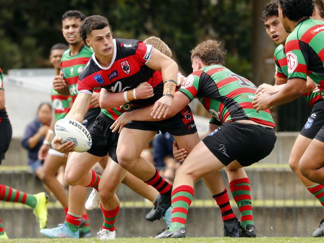 North Sydney forward Lachlan Mears-Crabbe looks for an offload against South Sydney Rabbitohs. Picture: Sam Ruttyn