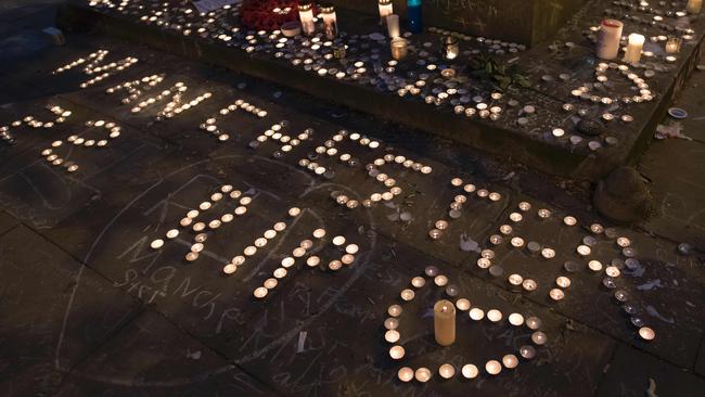 Memorial candles at a vigil on St Ann's Square in Manchester. Picture: AFP / Jon Super.