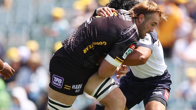 CANBERRA, AUSTRALIA - FEBRUARY 20: Izack Rodda of the Force is tackled during the round one Super Rugby Pacific match between the ACT Brumbies and the Western Force at GIO Stadium on February 20, 2022 in Canberra, Australia. (Photo by Mark Nolan/Getty Images)