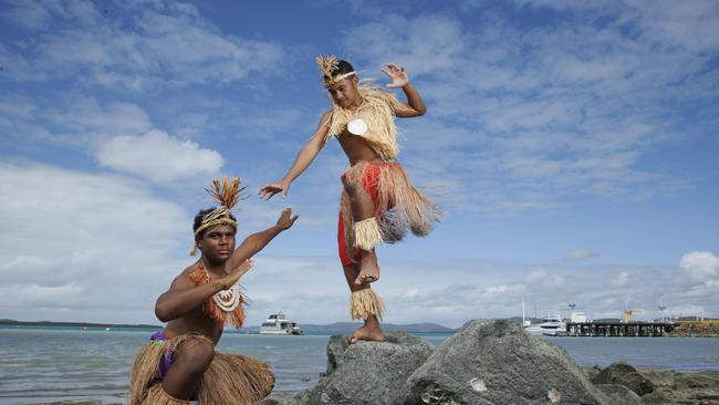 Local dancers Samaka Laifoo and Kunio Sagigi perform on Thursday Island as part of the inaugural Strait Experience enabling tourists to explore the Torres Strait in a day trip from Cairns. Picture Lachie Millard