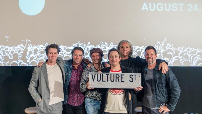Powderfinger with author Trent Dalton, who hosted the Q&A event at Palace Barracks cinema. Picture: Marianna Heberley