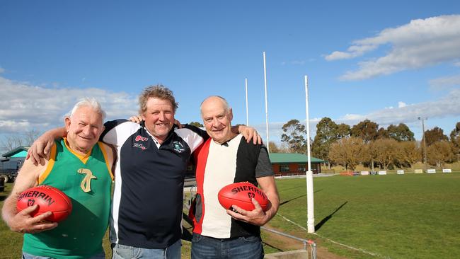 Orbost-Snowy Rovers president Royston Nettleton, centre, with former Orbost player Brett Lynn, left. and former Snowy Rovers player Denis Morgan. Picture Yuri Kouzmin