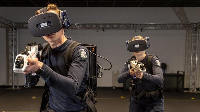 Constable Jonah Carey and Constable Alannah Lewis during visual reality (VR) simulation training.