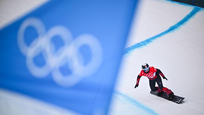 Switzerland's Sophie Hediger competes in the snowboard women's cross seeding run during the Beijing 2022 Winter Olympic Games. Picture: AFP