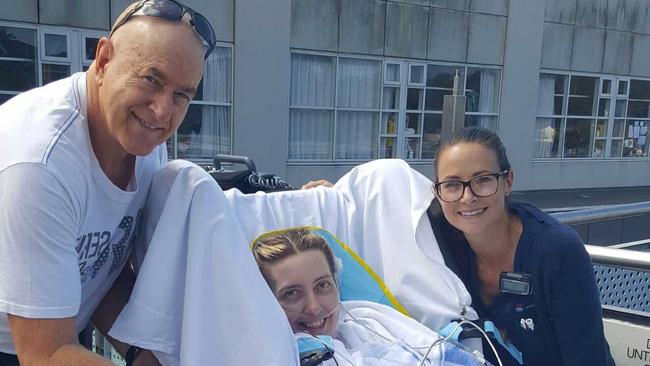 Sarah Joyce’s father Gary visits her at hospital last year.