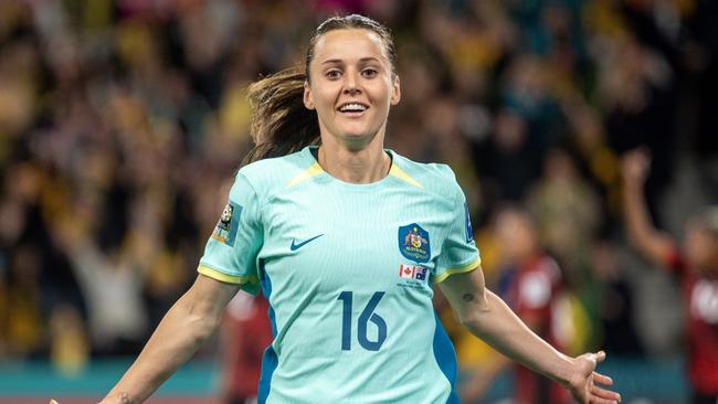 The Raso crest was there for all to see as Hayley celebrated two goals against Canada. Photo by Will Murray/Getty Images.