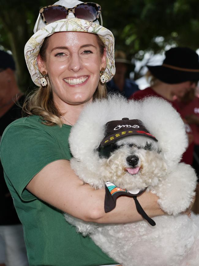 Natalie Anger gives Sunny a cuddle at the end of the RSPCA's Million Paws Walk fundraiser, held along the Cairns Esplanade. Picture: Brendan Radke