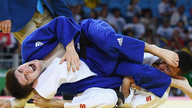 Josh Katz competes against Diyorbek Urozboev on Day 1 of the Rio 2016 Olympic Games at Carioca Arena 2 on August 6. Picture: David Ramos/Getty Images