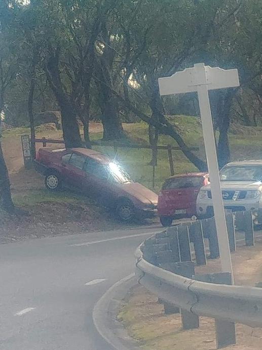 A woman has blown five times the legal alcohol limit after driving down an embankment at Belair.