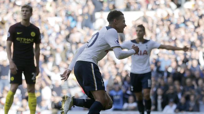 Tottenham Hotspur’s Dele Alli turns away after he scores.
