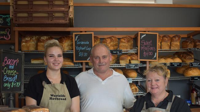 Westside Hotbread team members Grace Kenny and Fiona Woodley with owner and baker Darren Watts (middle).