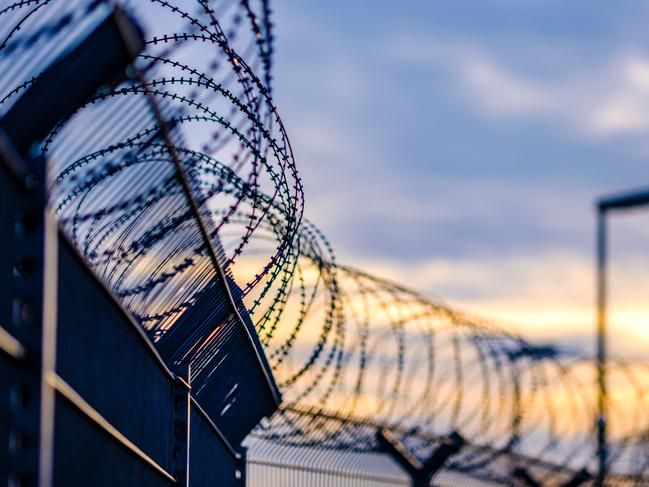 barbed razor wire jail prison istock