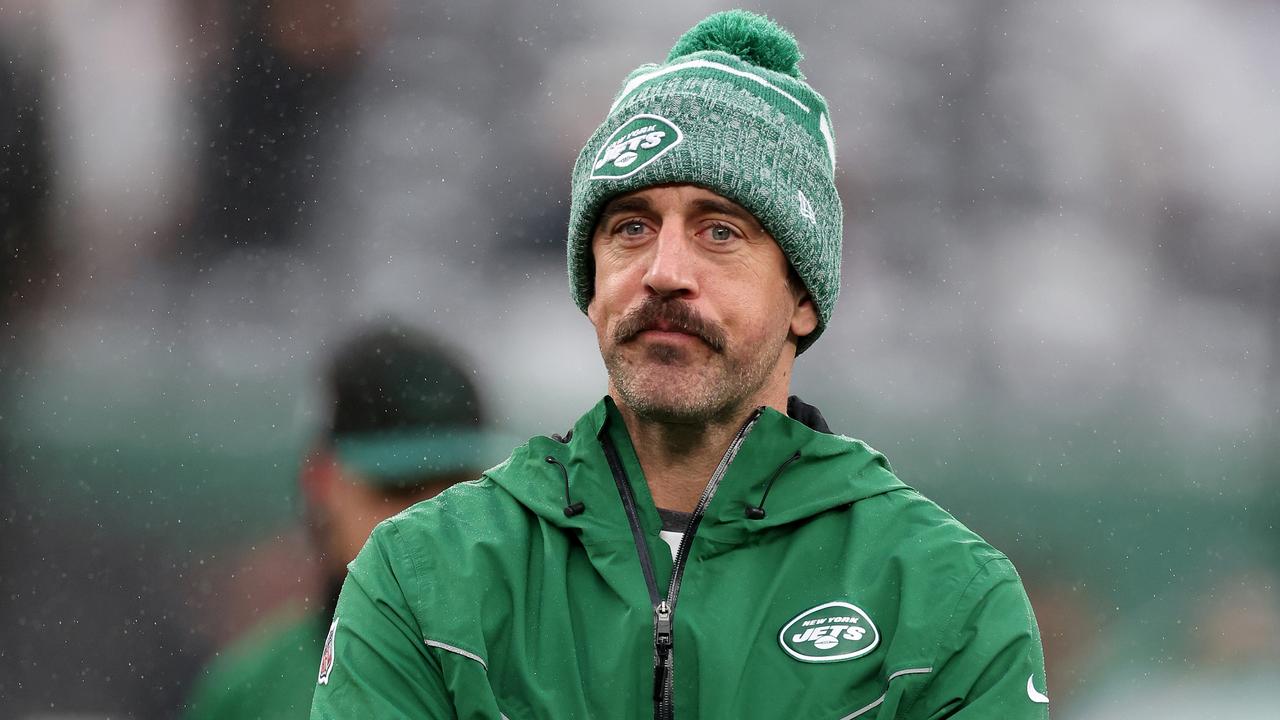 EAST RUTHERFORD, NEW JERSEY - DECEMBER 03: Aaron Rodgers #8 of the New York Jets looks on during warm ups prior to the game against the Atlanta Falcons at MetLife Stadium on December 03, 2023 in East Rutherford, New Jersey. (Photo by Al Bello/Getty Images)