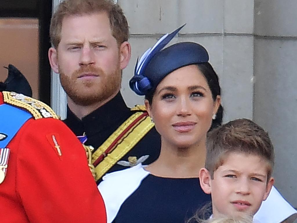 Royal watchers were convinced Harry and Meghan were having a marital tiff on the Buckingham Palace balcony during Trooping the Colour. Picture: AFP