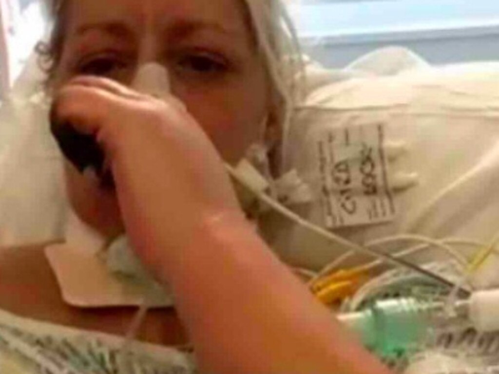 Michelle in hospital with blackened fingers, prior to the amputations. Picture: GoFundMe