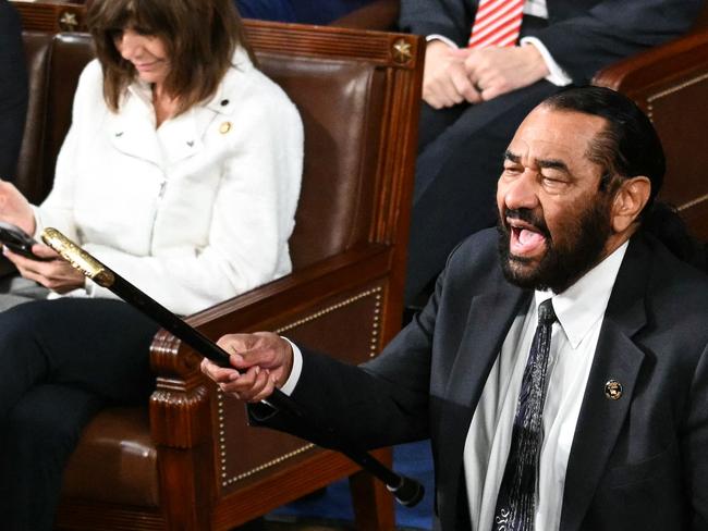 (FILES) US Representative Al Green (D-TX) shouts as US President Donald Trump speaks during an address to a joint session of Congress in the House Chamber of the US Capitol in Washington, DC, on March 4, 2025. The US House of Representatives censured Green on March 6, 2025, after he was thrown out of the chamber for repeatedly interrupting Trump's address to Congress on March 4. (Photo by Saul LOEB / AFP)