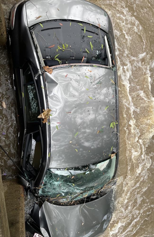 Dents can be seen all over the cars chassis including on the destroyed bonnet, roof, side and rear of the vehicle. Photo: Fergus Gregg