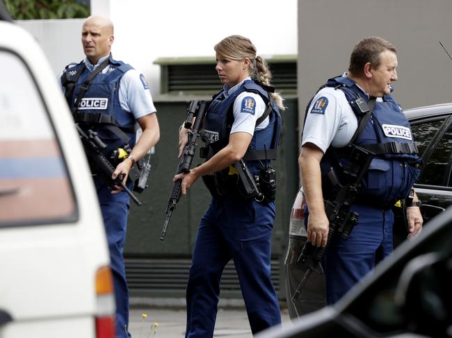 Armed police patrol outside a mosque in central Christchurch. Picture: AP