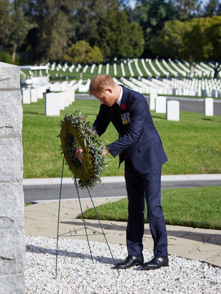 Prince Harry lays a wreath. Photographer: Lee Morgan