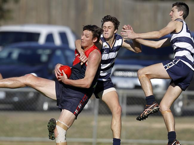 Laurence Angwin takes a mark while playing for Ouyen in 2015, when it was known as the Demons. Picture: Yuri Kouzmin