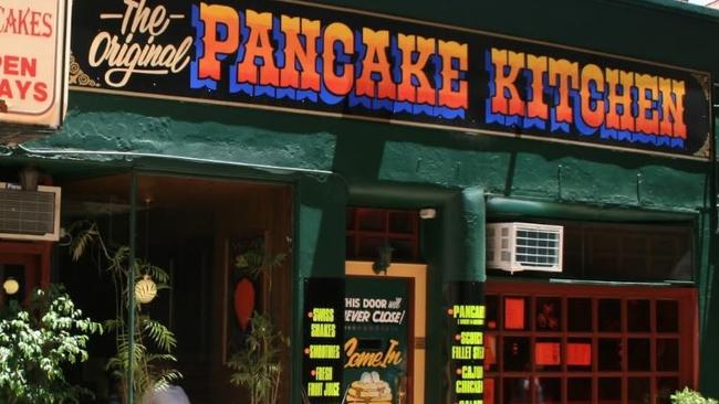 This “door will never close” says the sign out the front of the popular 24-hour pancake restaurant.