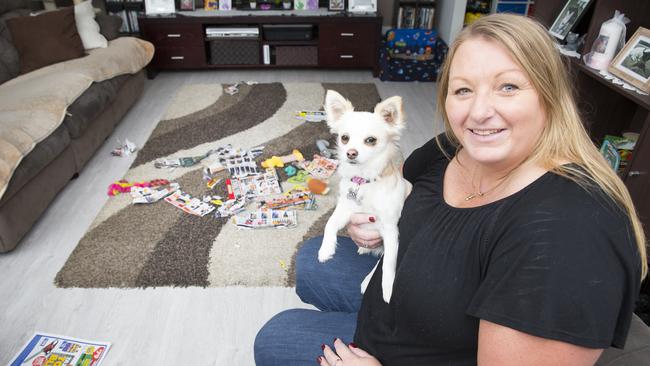 Sandra with her pooch, whose hobby is destroying items around the house and backyard. Picture: Melvyn Knipe