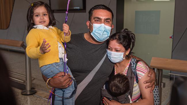 Vikram Kapoor’s emotional reunion with wife Priya, daughter Amayra and son Harvyn. Picture: Jason Edwards