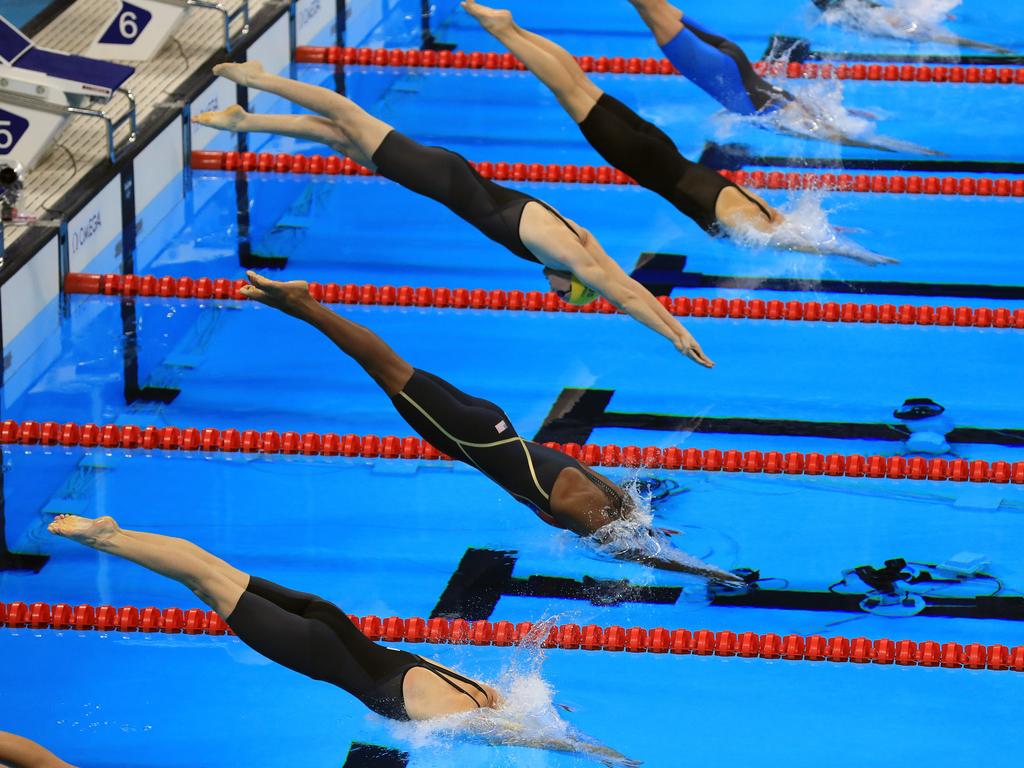 Rio Olympics 2016. The Swimming finals and semifinals on day 06, at the Olympic Aquatic Centre in Rio de Janeiro, Brazil. Bronte Campbell [lane 2] and Cate Campbell [lane 4] dive in for the final of the WomenÕs 100m Freestyle. Picture: Alex Coppel