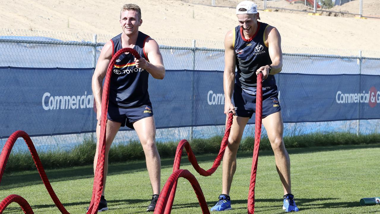 Adelaide’s Andrew McPherson and Tom Doedee training before the Christmas break. Picture: Sarah Reed