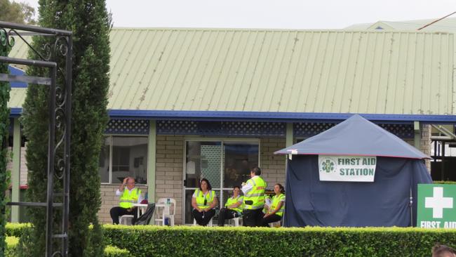 First aid volunteers sitting around at the Gold Coast Turf Club as revellers are on their best behaviour this afternoon.